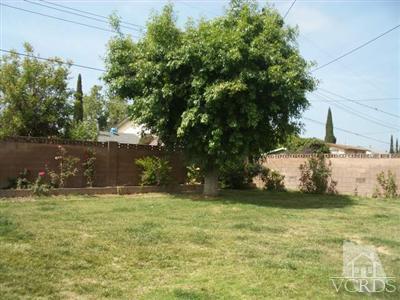 Undisclosed Address Simi Valley, CA 93065 - Photo 5 of 5 a backyard of a house with lots of green space