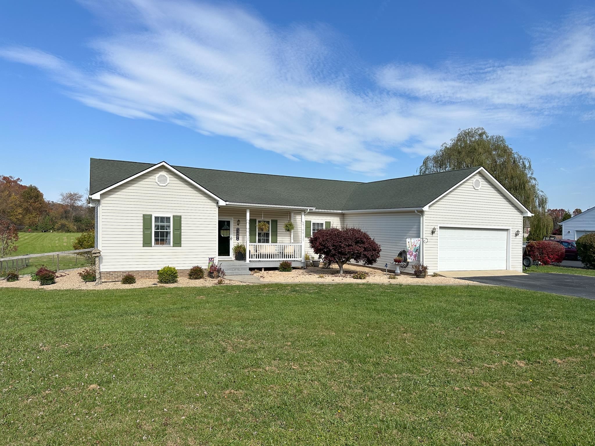 3427 Lyndhurst Road Stuarts Draft, VA 24477 - Photo 1 of 36 a view of a house with a yard and garage