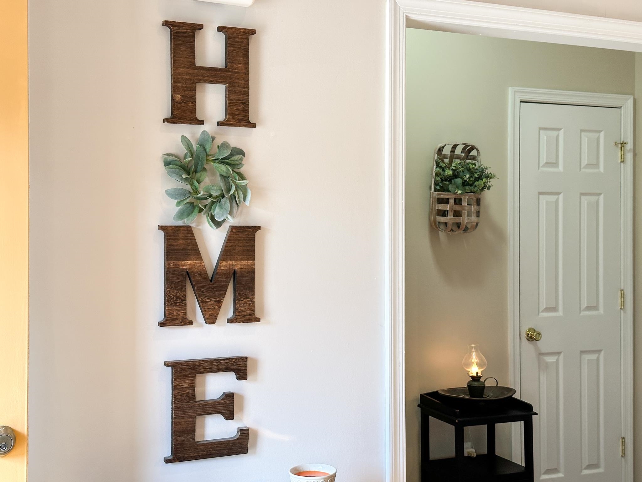 3427 Lyndhurst Road Stuarts Draft, VA 24477 - Photo 11 of 36 a view of a hallway with wooden floor and a potted plant