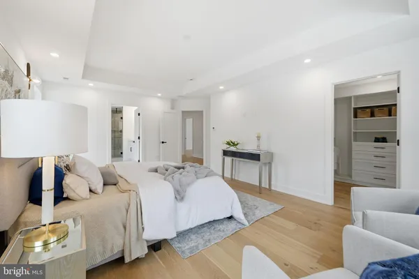 a bed room with a bed and a couch