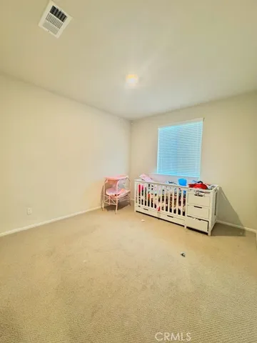 a living room with a couch and a table