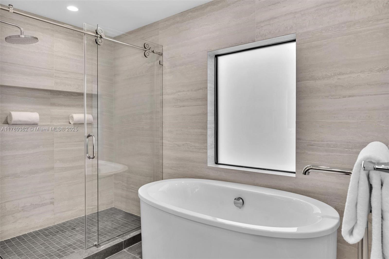 1389 Southwest 22nd Terrace Miami, FL 33145 - Photo 32 of 63 a bathroom with a tub and a shower