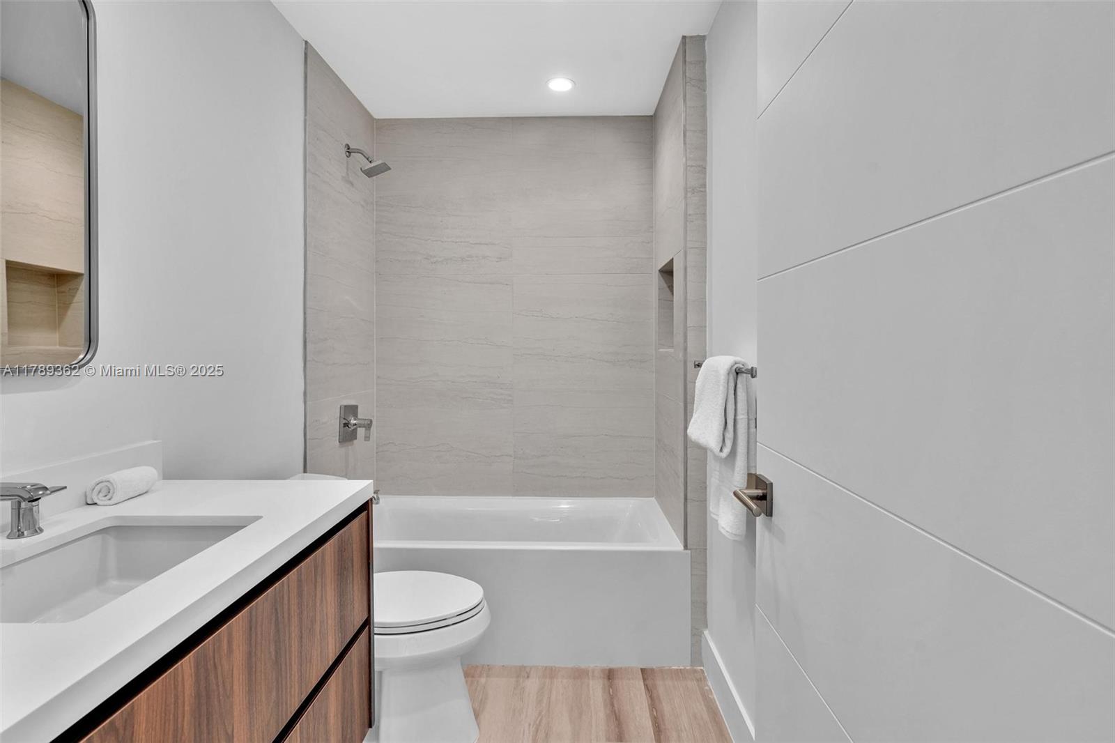 1389 Southwest 22nd Terrace Miami, FL 33145 - Photo 39 of 63 a bathroom with a sink a toilet and shower
