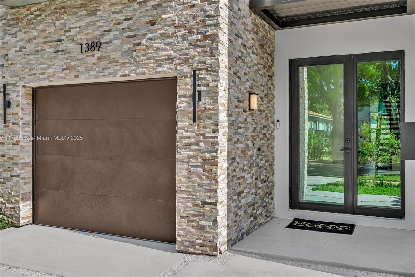 1389 Southwest 22nd Terrace Miami, FL 33145 - Photo 58 of 63 a door view with a outdoor space