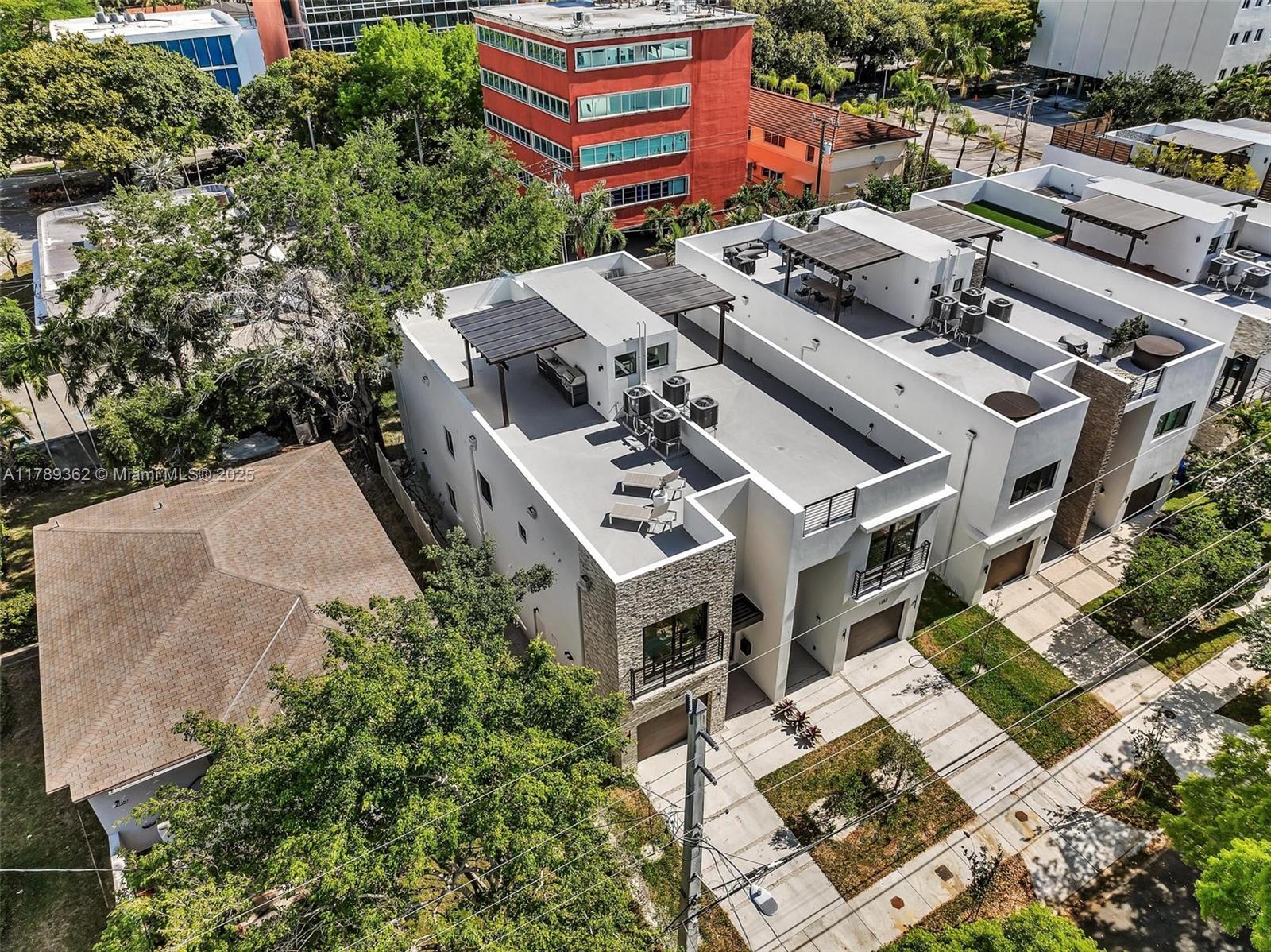 1389 Southwest 22nd Terrace Miami, FL 33145 - Photo 62 of 63 an aerial view of a house with a yard