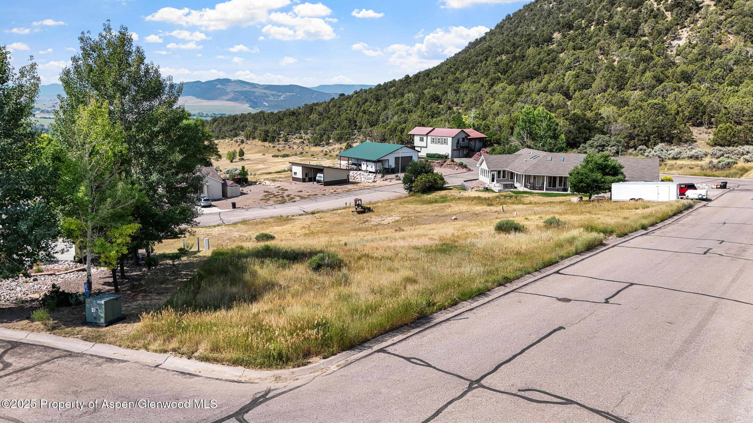 a swimming pool with outdoor seating and yard