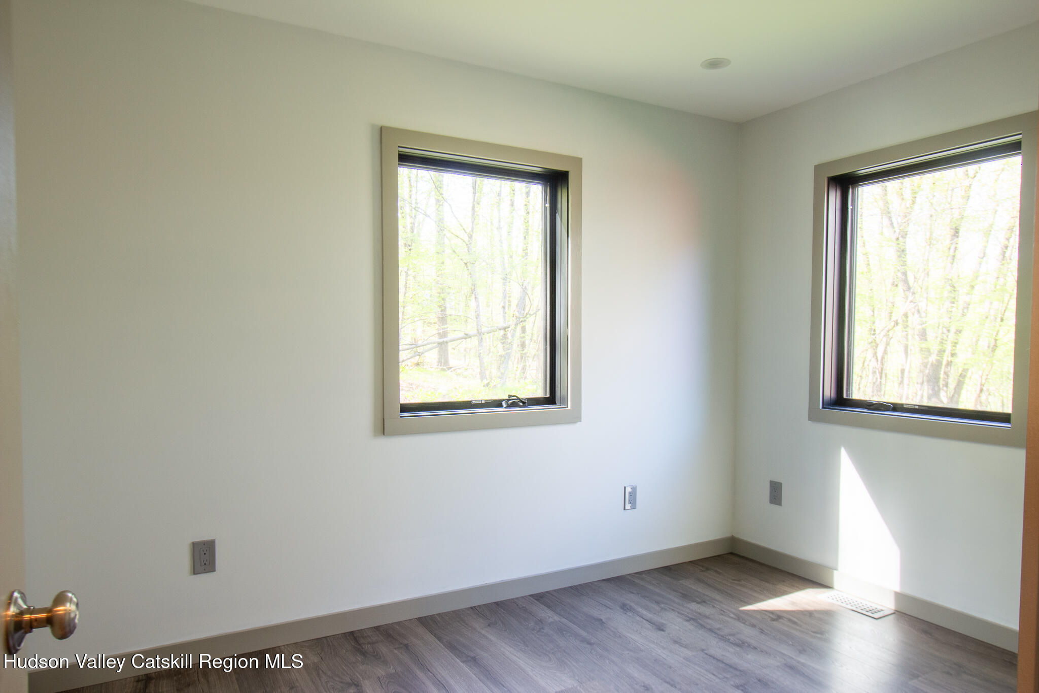 30 Ridge Lane Hillsdale, NY 12529 - Photo 14 of 14 an empty room with wooden floor and windows