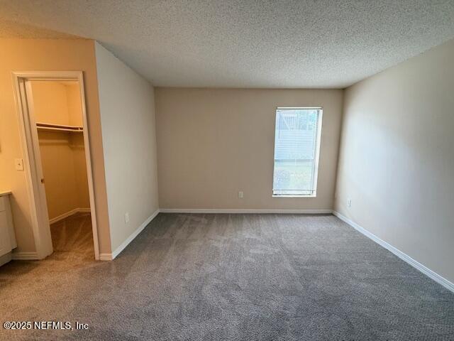 10200 Belle Rive Boulevard, Unit 69 Jacksonville, FL 32256 - Photo 16 of 27 an empty room with windows
