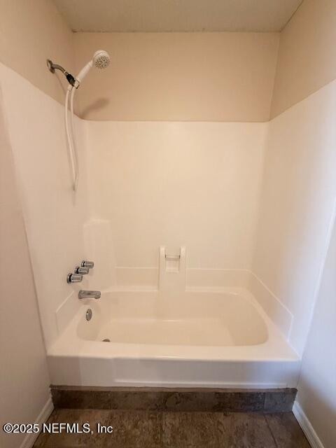 10200 Belle Rive Boulevard, Unit 69 Jacksonville, FL 32256 - Photo 19 of 27 a bathroom with a bathtub