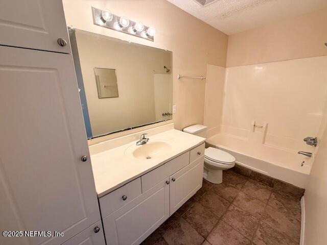 10200 Belle Rive Boulevard, Unit 69 Jacksonville, FL 32256 - Photo 24 of 27 a bathroom with a granite countertop sink toilet and shower