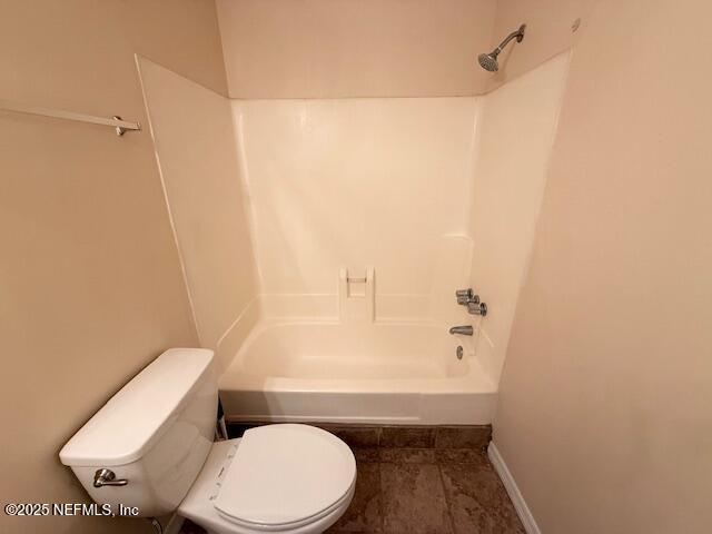 10200 Belle Rive Boulevard, Unit 69 Jacksonville, FL 32256 - Photo 25 of 27 a bathroom with a toilet and a shower