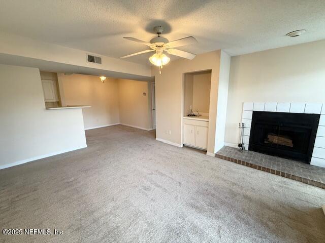 10200 Belle Rive Boulevard, Unit 69 Jacksonville, FL 32256 - Photo 6 of 27 a view of an empty room with a fireplace and a ceiling fan