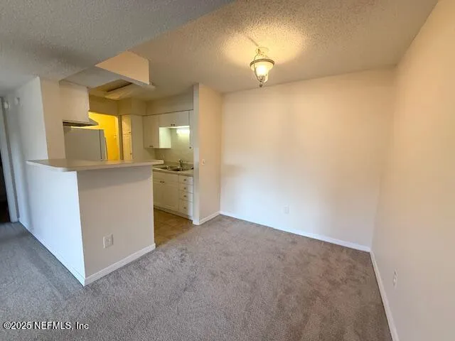 a view of a livingroom with a window