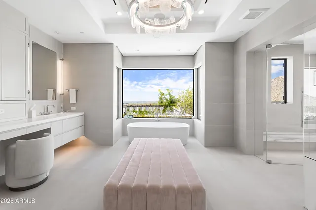 a view of a kitchen with a sink and dishwasher with wooden floor