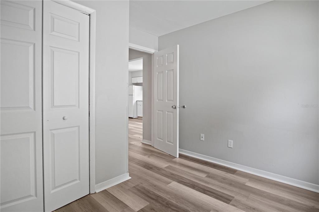 1480 32nd Street Northwest Winter Haven, FL 33881 - Photo 10 of 13 wooden floor and closet area in a room