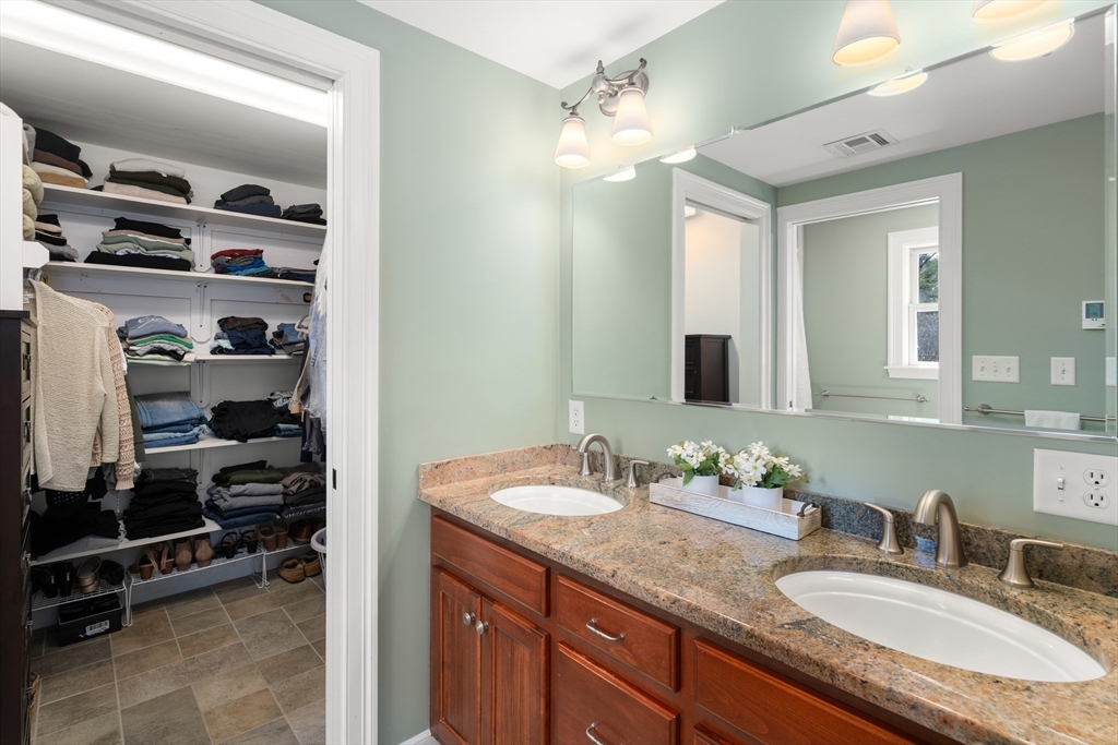 23 Alta Road Sudbury, MA 01776 - Photo 17 of 38 a bathroom with a granite countertop double vanity