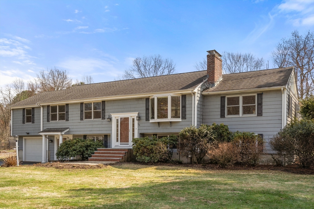 23 Alta Road Sudbury, MA 01776 - Photo 2 of 38 a front view of a house with a yard