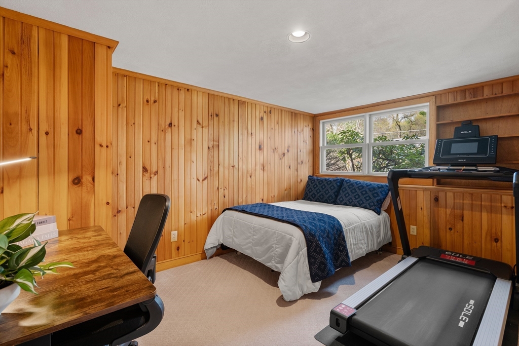 23 Alta Road Sudbury, MA 01776 - Photo 26 of 38 a bedroom with a bed and wooden floor