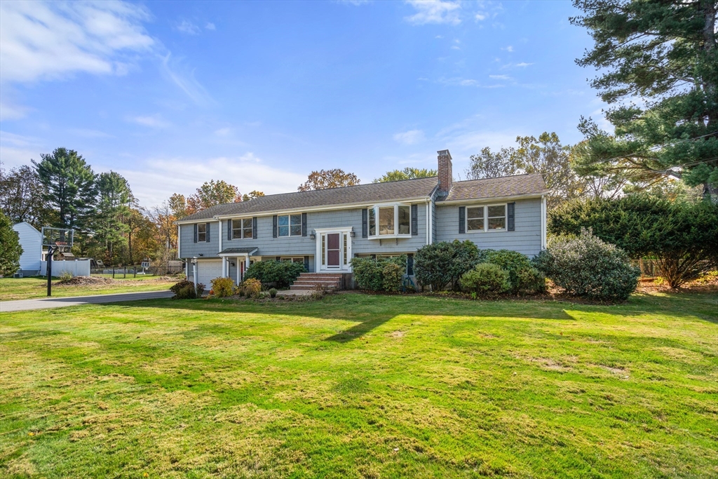 23 Alta Road Sudbury, MA 01776 - Photo 31 of 38 a view of a house with a big yard and large trees