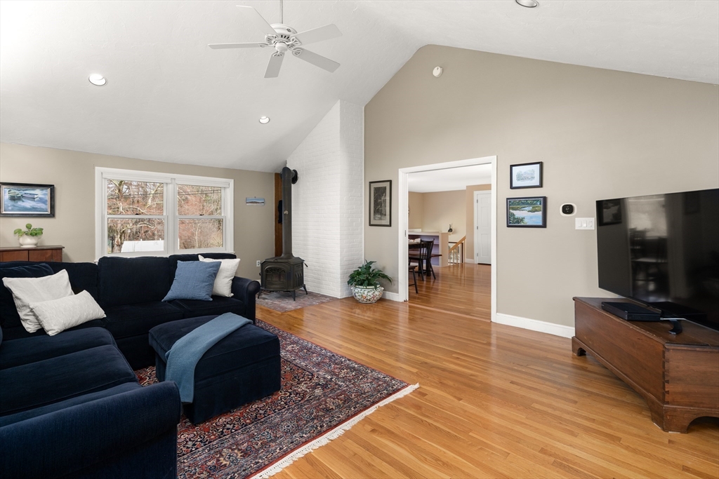 23 Alta Road Sudbury, MA 01776 - Photo 6 of 38 a living room with furniture and a flat screen tv