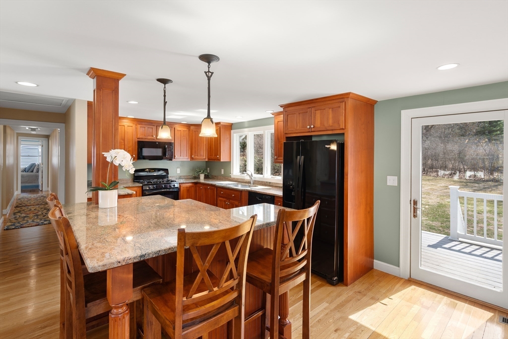 23 Alta Road Sudbury, MA 01776 - Photo 7 of 38 a view of a dining room with furniture