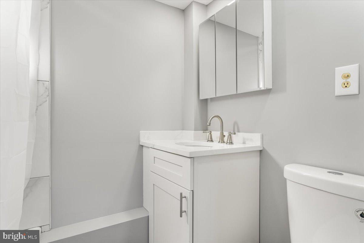 114 Cookstown New Egypt Road Wrightstown, NJ 08562 - Photo 11 of 30 a utility room with sink dryer and washer
