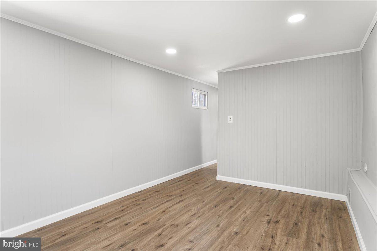 114 Cookstown New Egypt Road Wrightstown, NJ 08562 - Photo 17 of 30 a view of an empty room with wooden floor