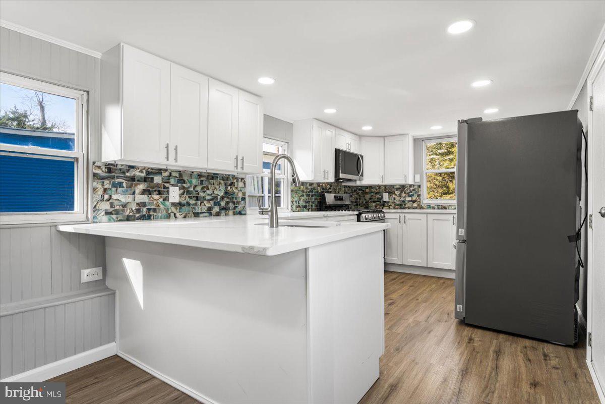 114 Cookstown New Egypt Road Wrightstown, NJ 08562 - Photo 20 of 30 a kitchen with refrigerator and cabinets