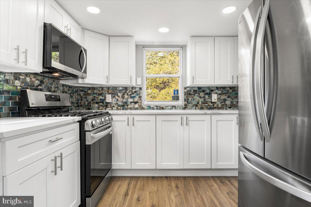 114 Cookstown New Egypt Road Wrightstown, NJ 08562 - Photo 21 of 30 a kitchen with stainless steel appliances granite countertop a refrigerator sink and microwave