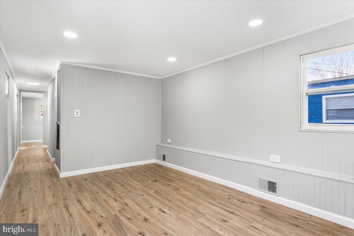 114 Cookstown New Egypt Road Wrightstown, NJ 08562 - Photo 30 of 30 wooden floor in an empty room with a window