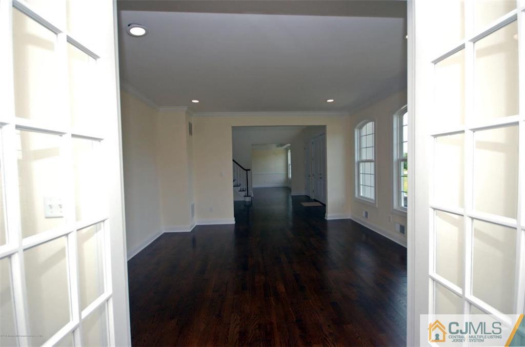 4 Beacon Hill Millstone Township, NJ 08510 - Photo 13 of 19 a view of gallery with wooden floor