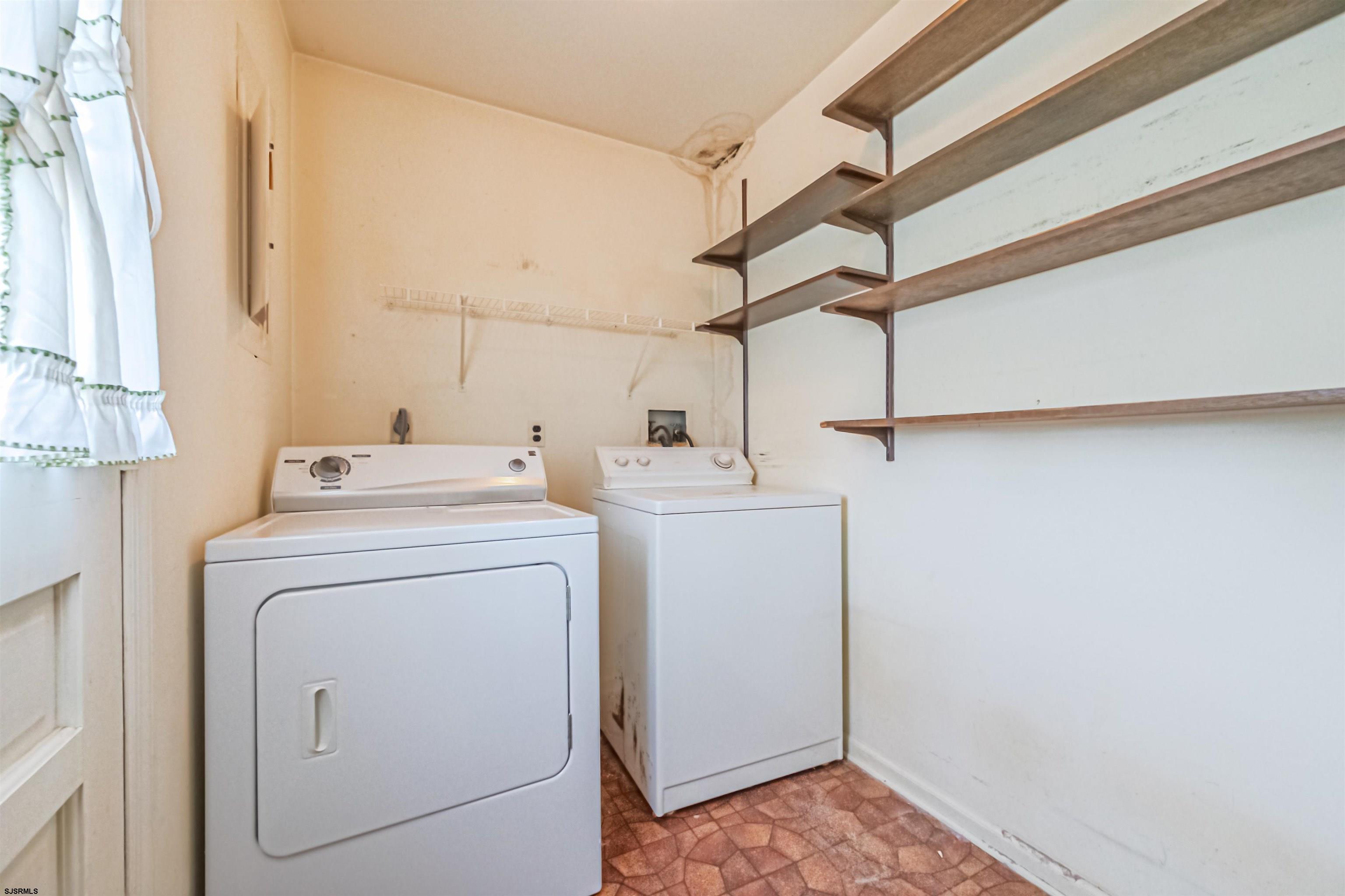 125 North Shore Road Marmora, NJ 08223 - Photo 17 of 29 a utility room with dryer and washer