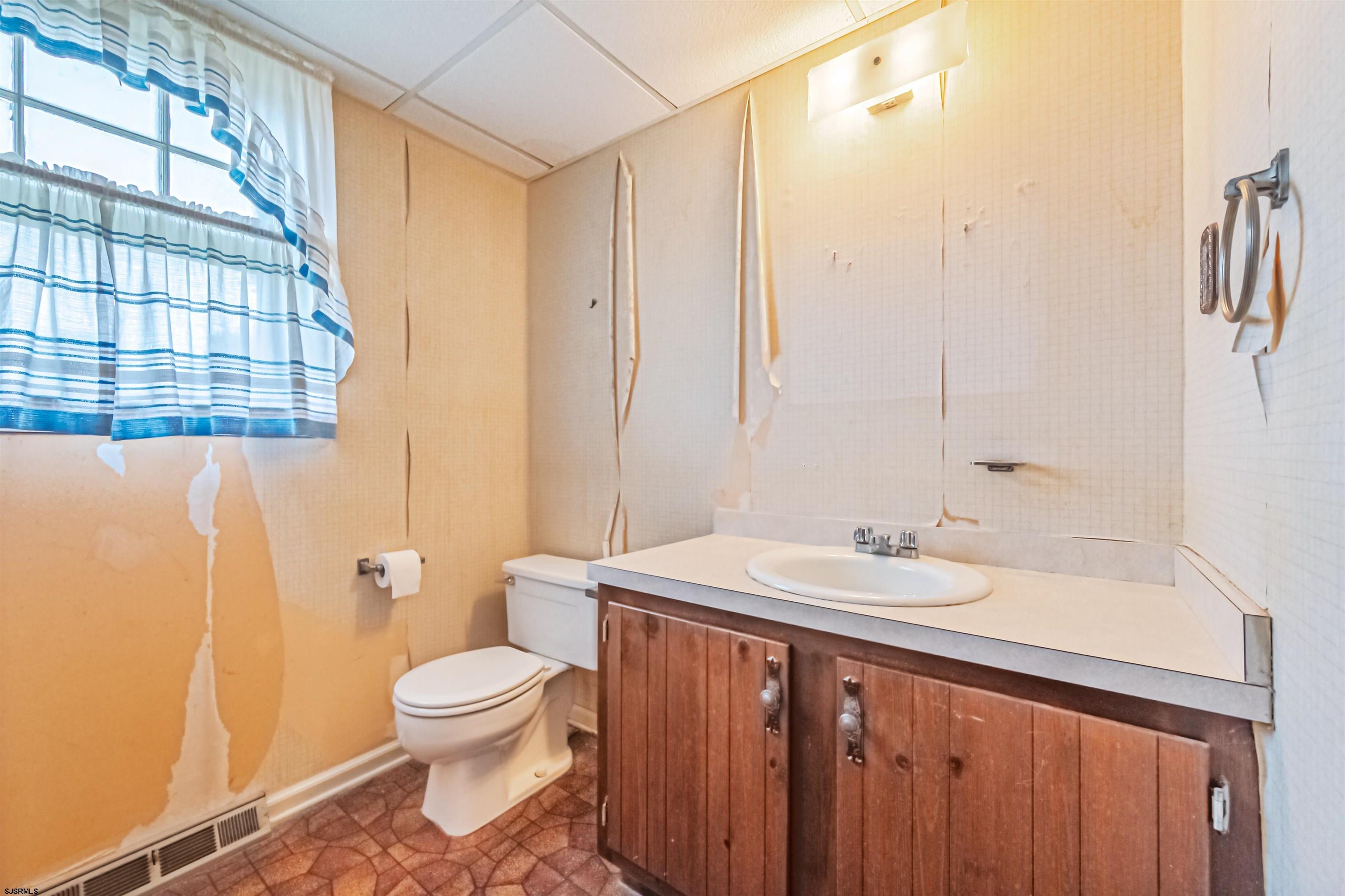 125 North Shore Road Marmora, NJ 08223 - Photo 18 of 29 a bathroom with a sink a toilet and shower