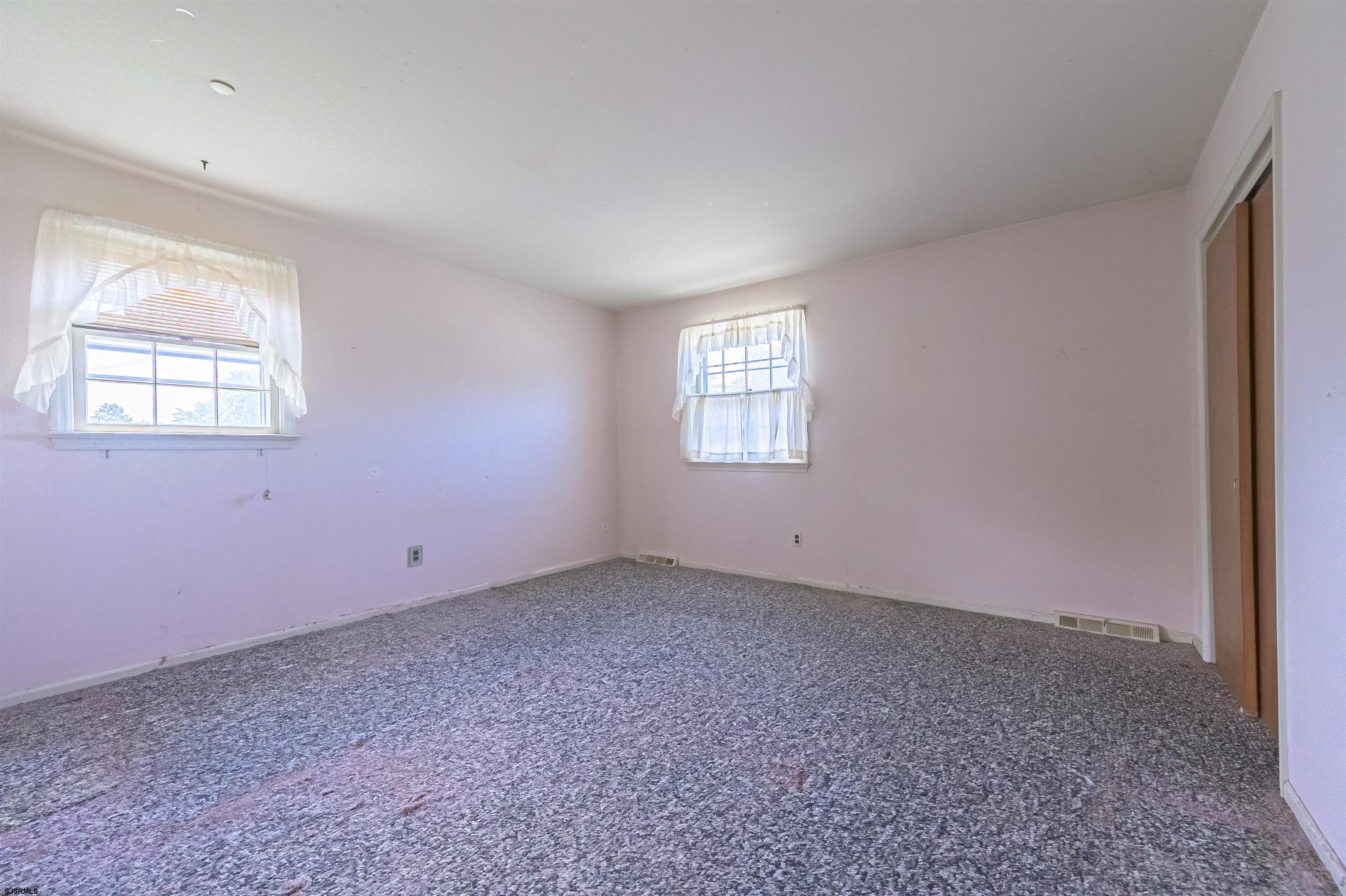 125 North Shore Road Marmora, NJ 08223 - Photo 20 of 29 an empty room with windows
