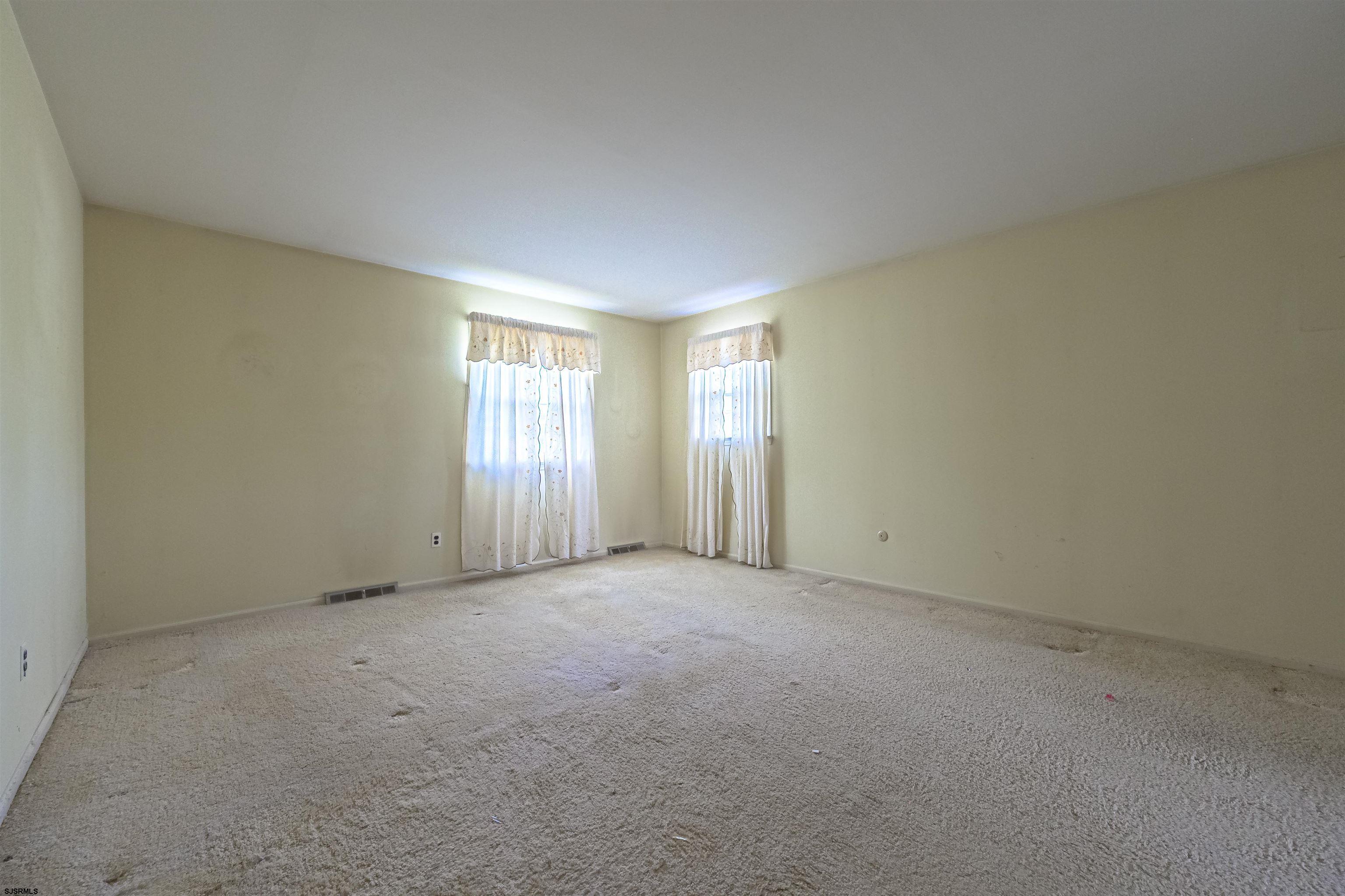 125 North Shore Road Marmora, NJ 08223 - Photo 23 of 29 an empty room with windows