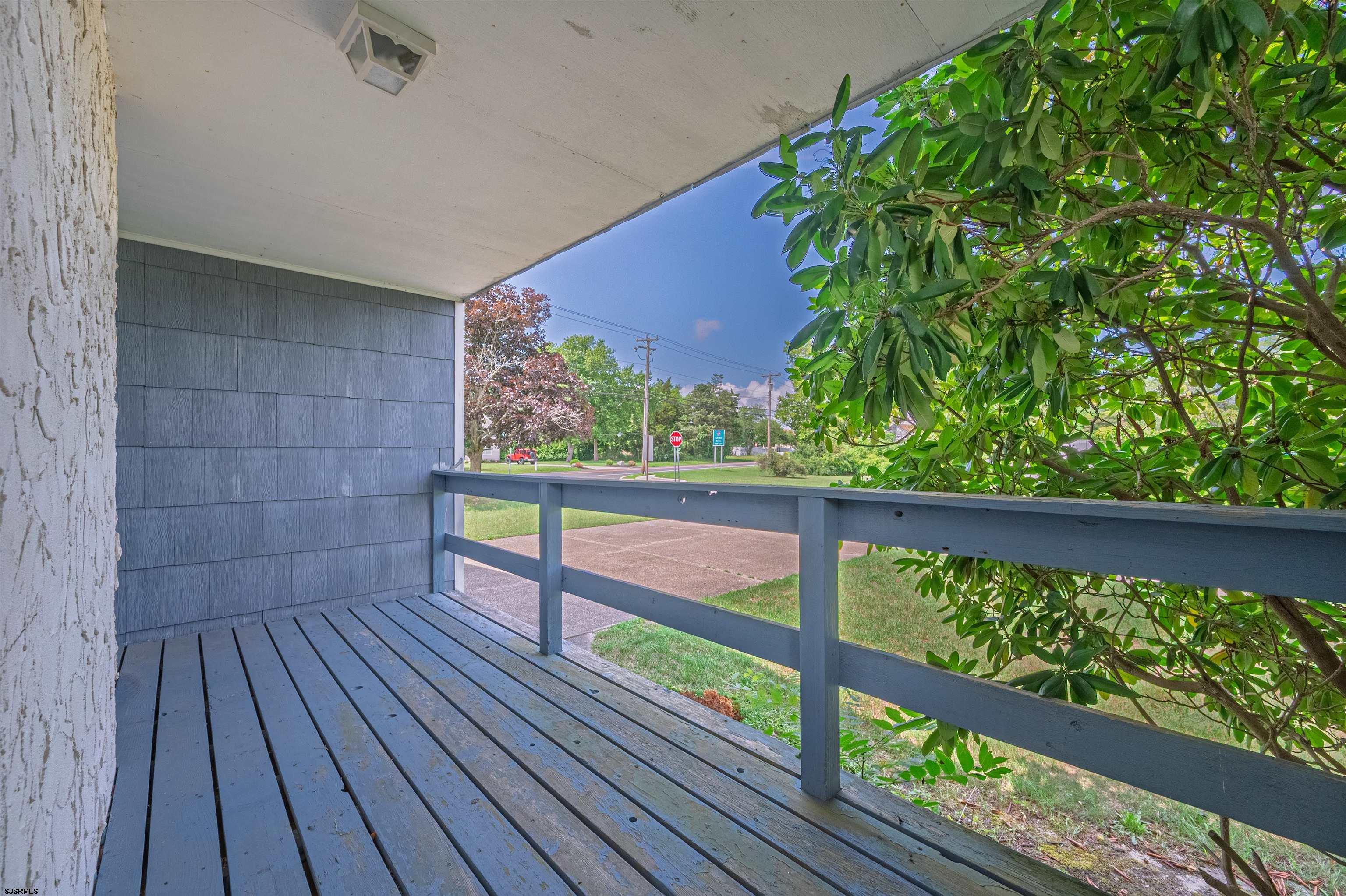 125 North Shore Road Marmora, NJ 08223 - Photo 6 of 29 a view of a wooden deck