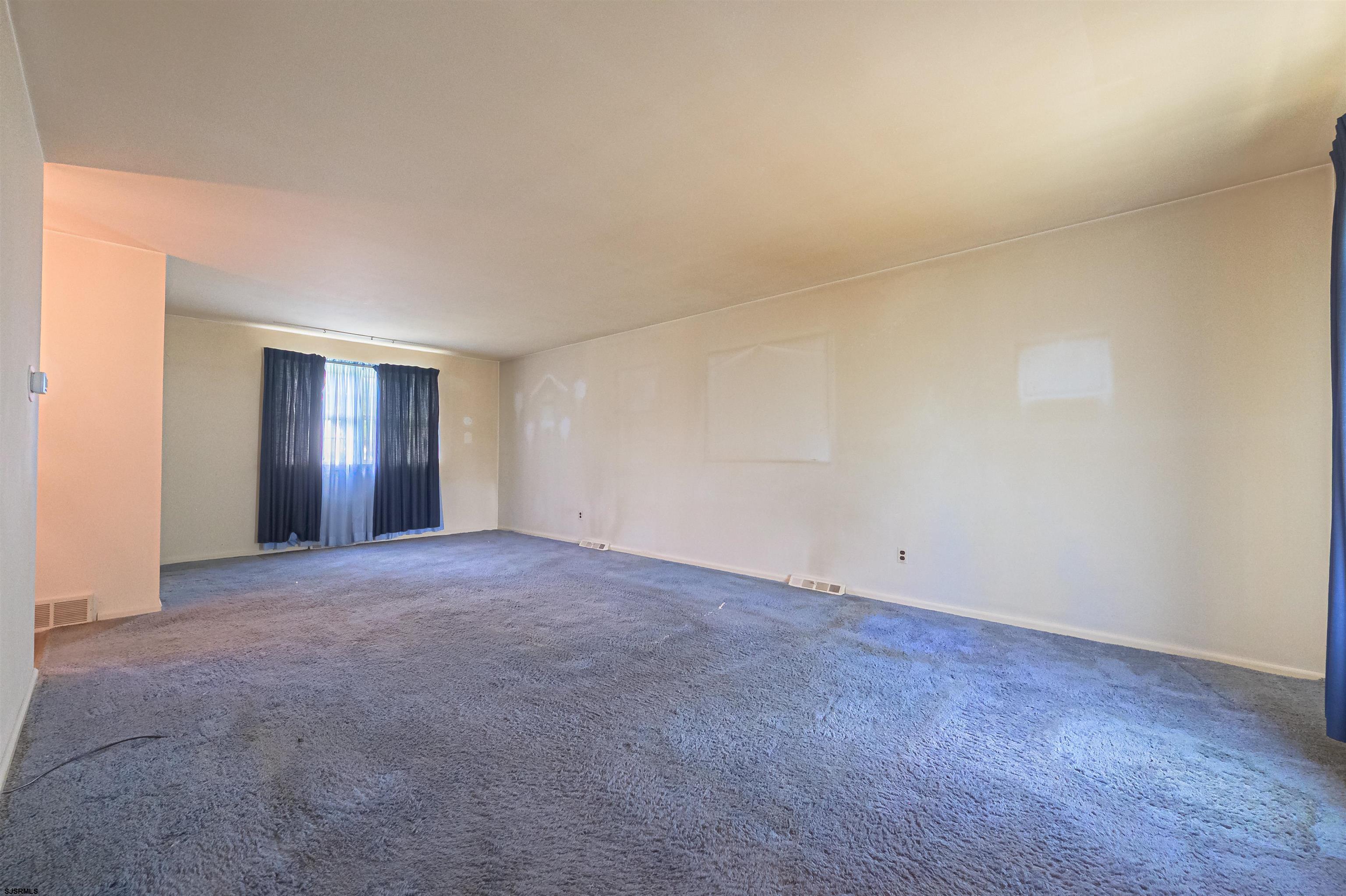 125 North Shore Road Marmora, NJ 08223 - Photo 7 of 29 a view of an empty room with closet and entryway