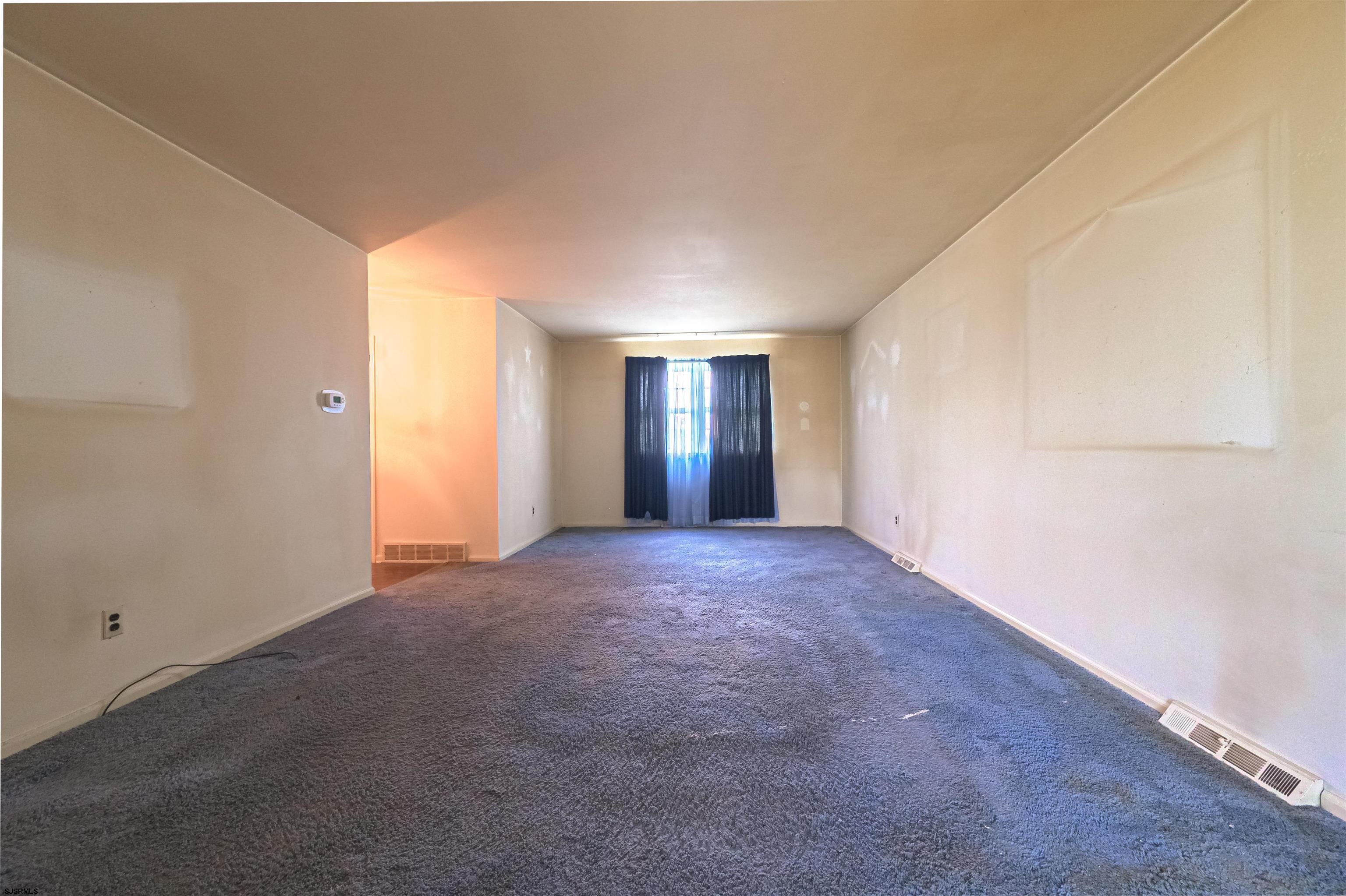 125 North Shore Road Marmora, NJ 08223 - Photo 8 of 29 a view of an empty room with closet and entryway