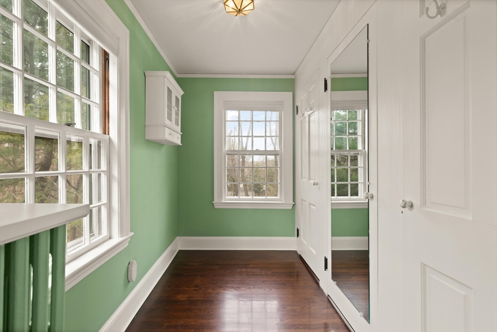 11 Eliot Road Lexington, MA 02421 - Photo 23 of 36 a view of an entryway with wooden floor and a window