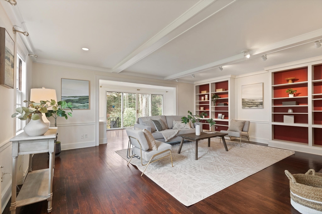 11 Eliot Road Lexington, MA 02421 - Photo 6 of 36 a living room with furniture and a wooden floor