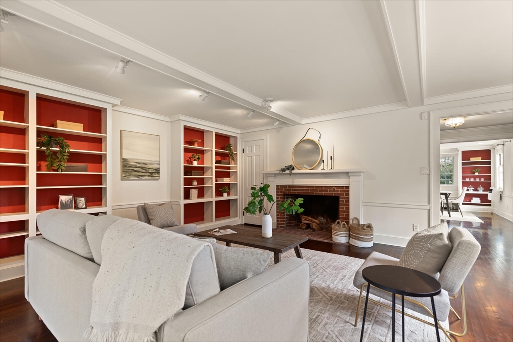 11 Eliot Road Lexington, MA 02421 - Photo 8 of 36 a living room with furniture a fireplace and a piano