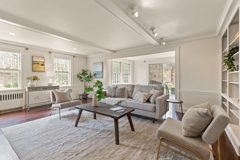 11 Eliot Road Lexington, MA 02421 - Photo 9 of 36 a living room with furniture and wooden floor