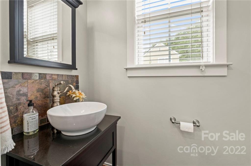 489 Jetton Street Davidson, NC 28036 - Photo 17 of 33 a view of a room with furniture and window