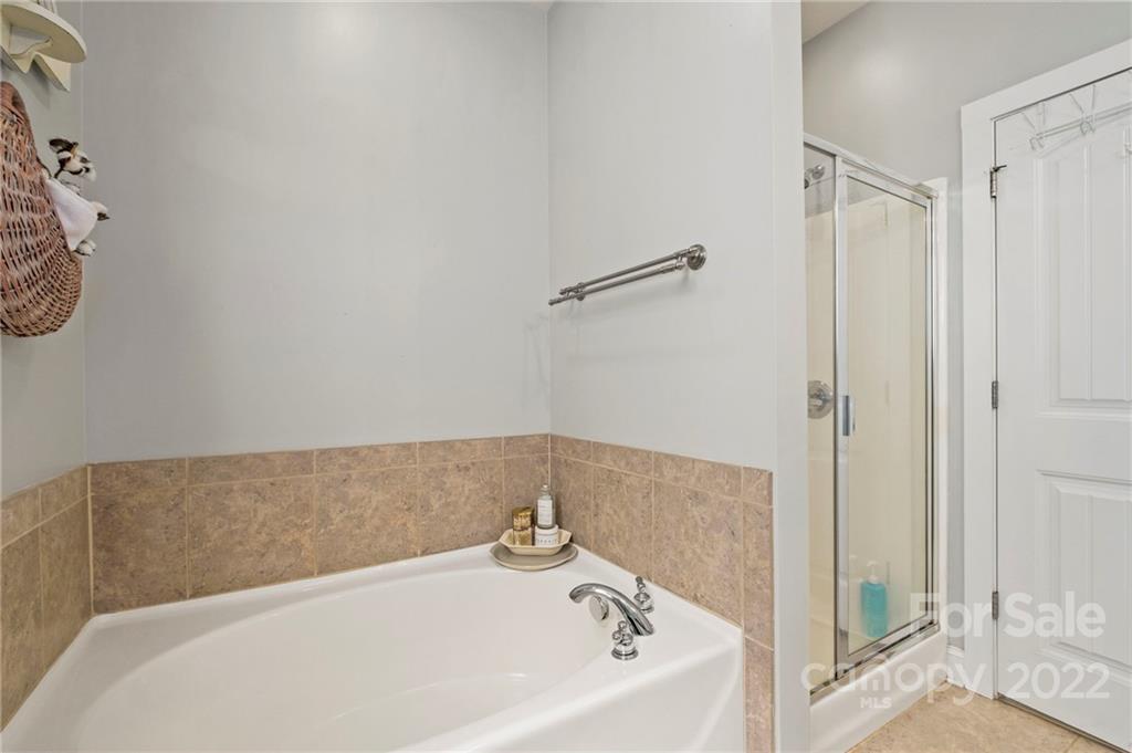 489 Jetton Street Davidson, NC 28036 - Photo 26 of 33 a bathroom with a bathtub