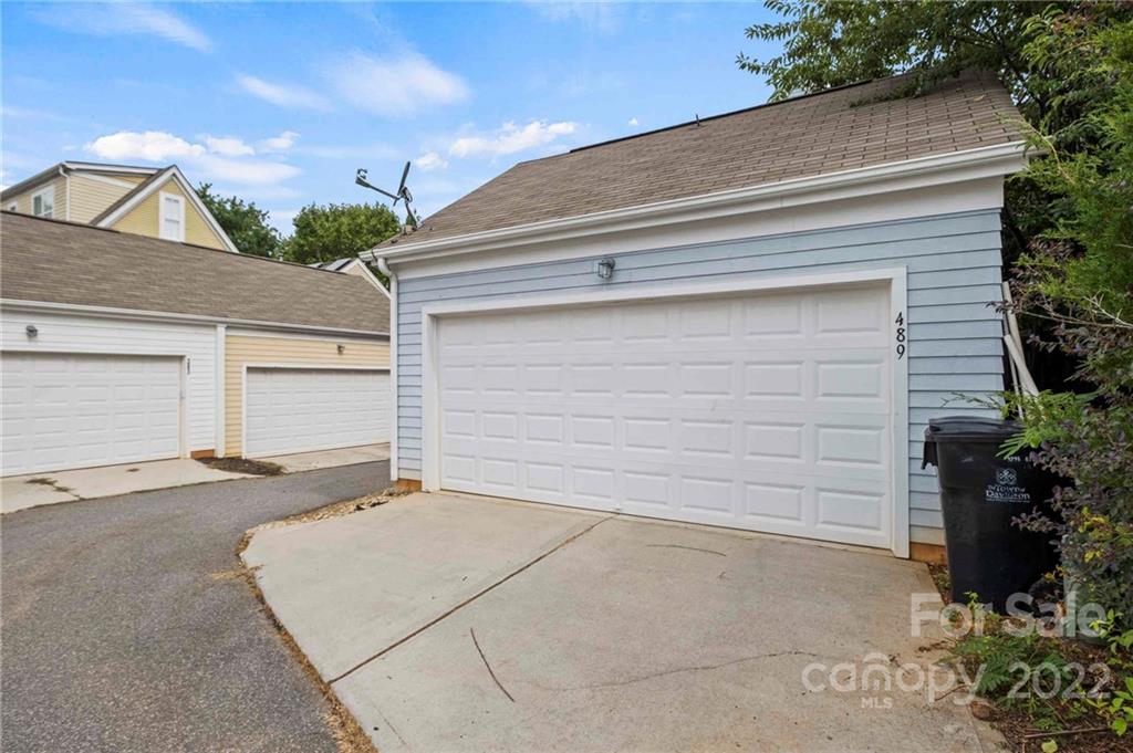 489 Jetton Street Davidson, NC 28036 - Photo 32 of 33 a view of garage and yard