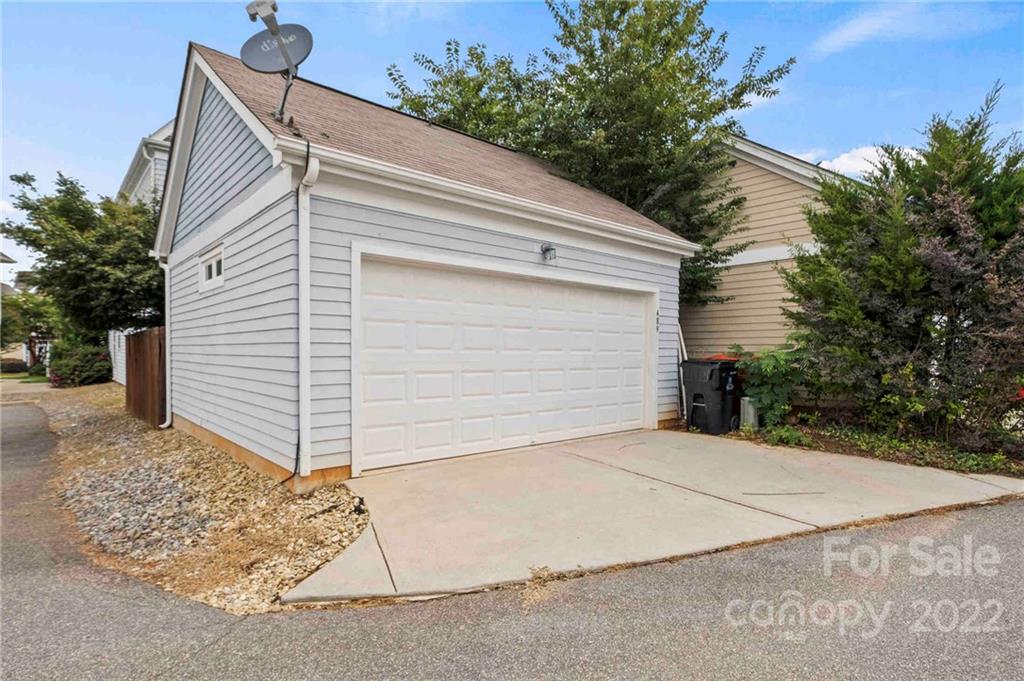 489 Jetton Street Davidson, NC 28036 - Photo 33 of 33 a view of a house with a yard and garage