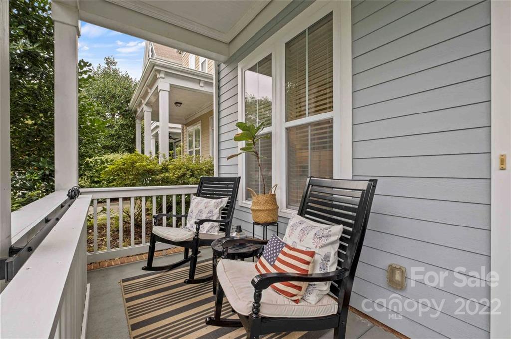 489 Jetton Street Davidson, NC 28036 - Photo 5 of 33 a view of two chairs in the balcony