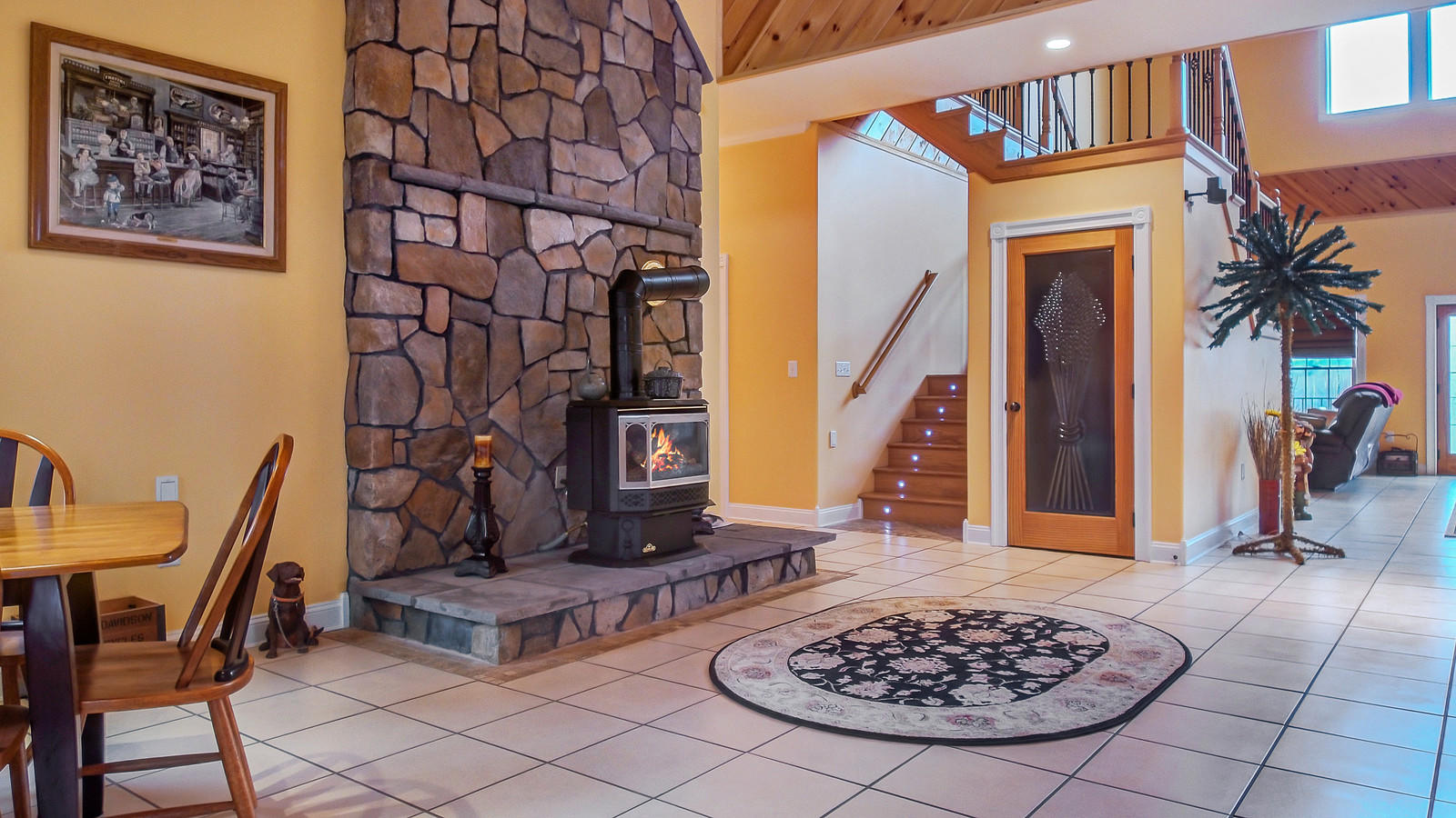 707 Hampden Road Carmel, ME 04419 - Photo 13 of 53 Propane fireplace heats open plan