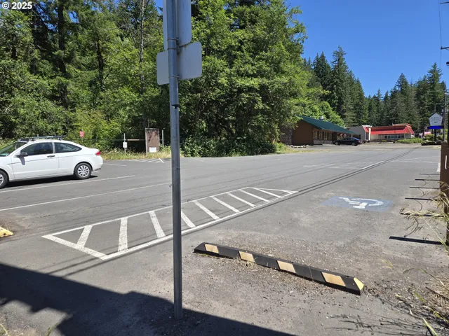 a view of street with parked cars