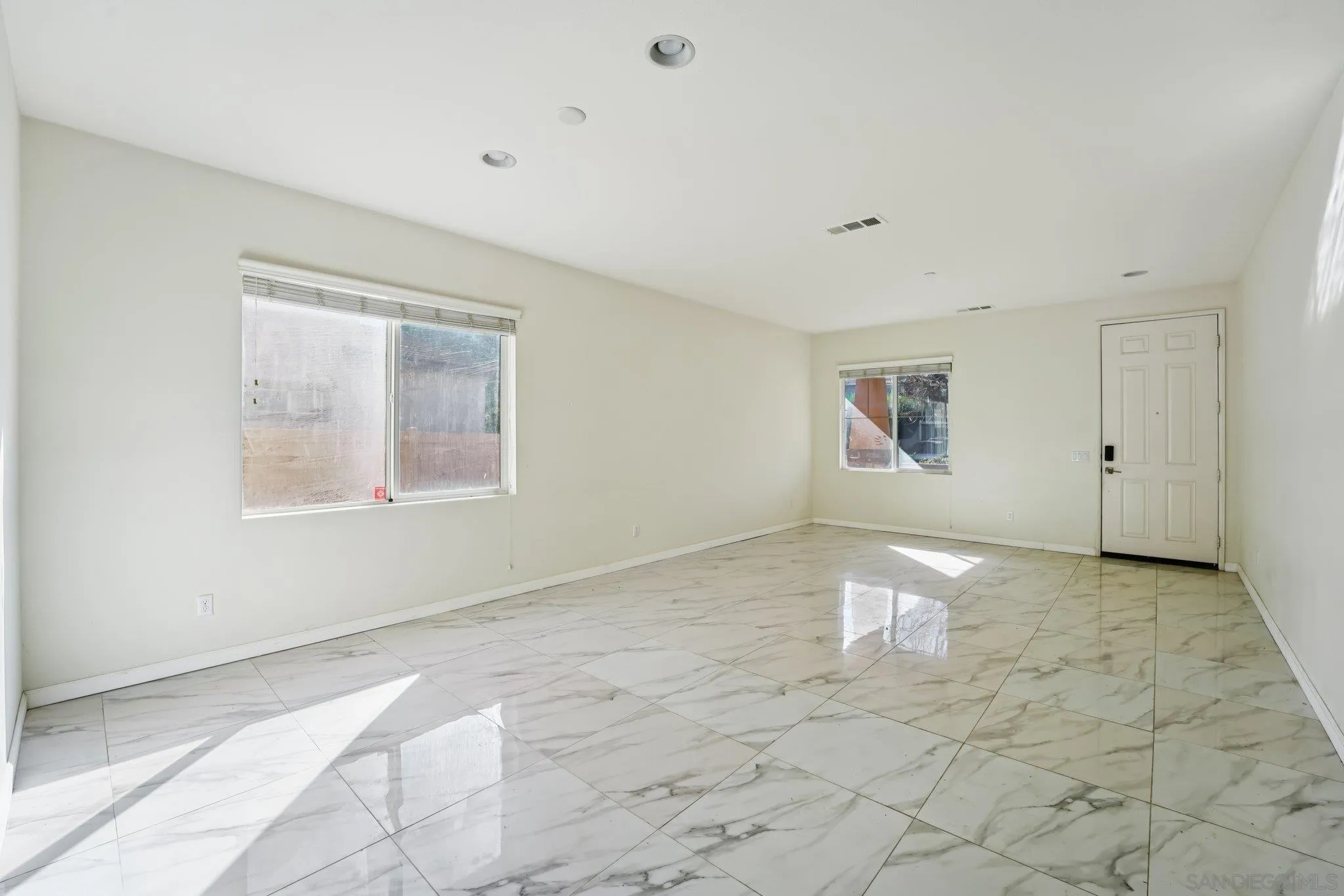 31890 Rouge Lane Menifee, CA 92584 - Photo 11 of 40 a view of an empty room with a window